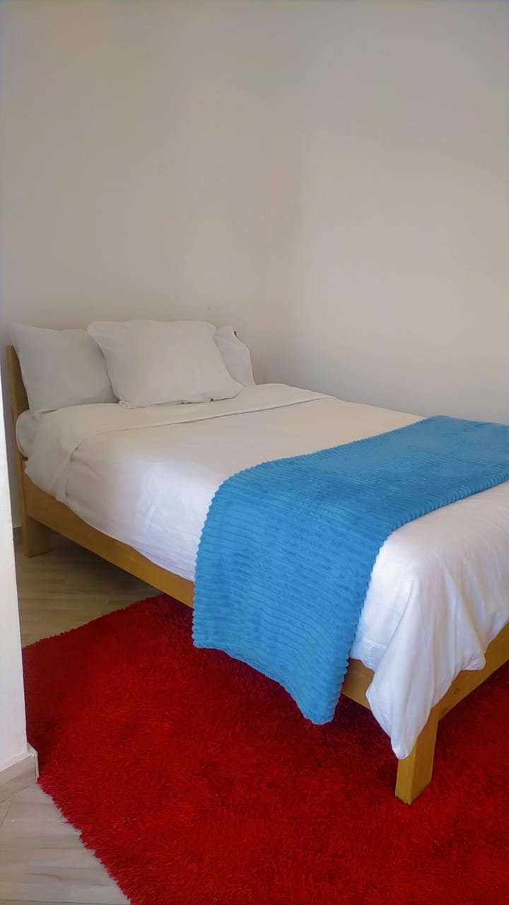 Bright guest bedroom interior